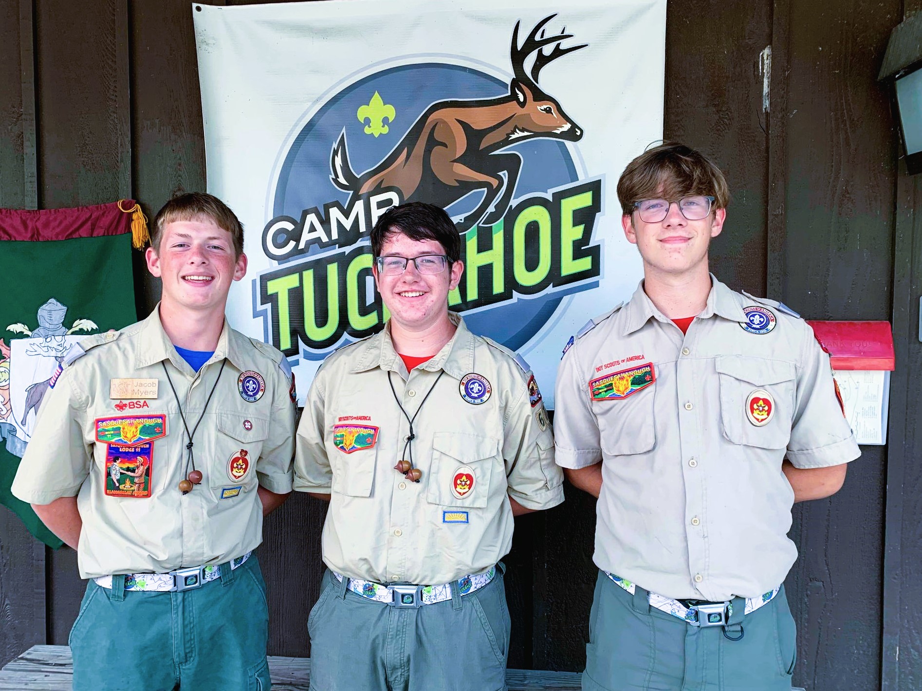 Picture of three Eagle Scouts. From left to right, Jacob Myers, Caleb Myers and Joshua Myers